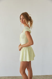 side view | bright pastel yellow lace puff sleeve mini dress | summer dress outfits