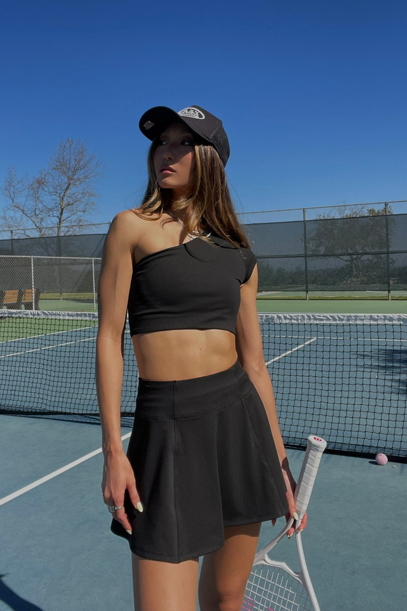 black high-waisted flare mini tennis skort with built in shorts