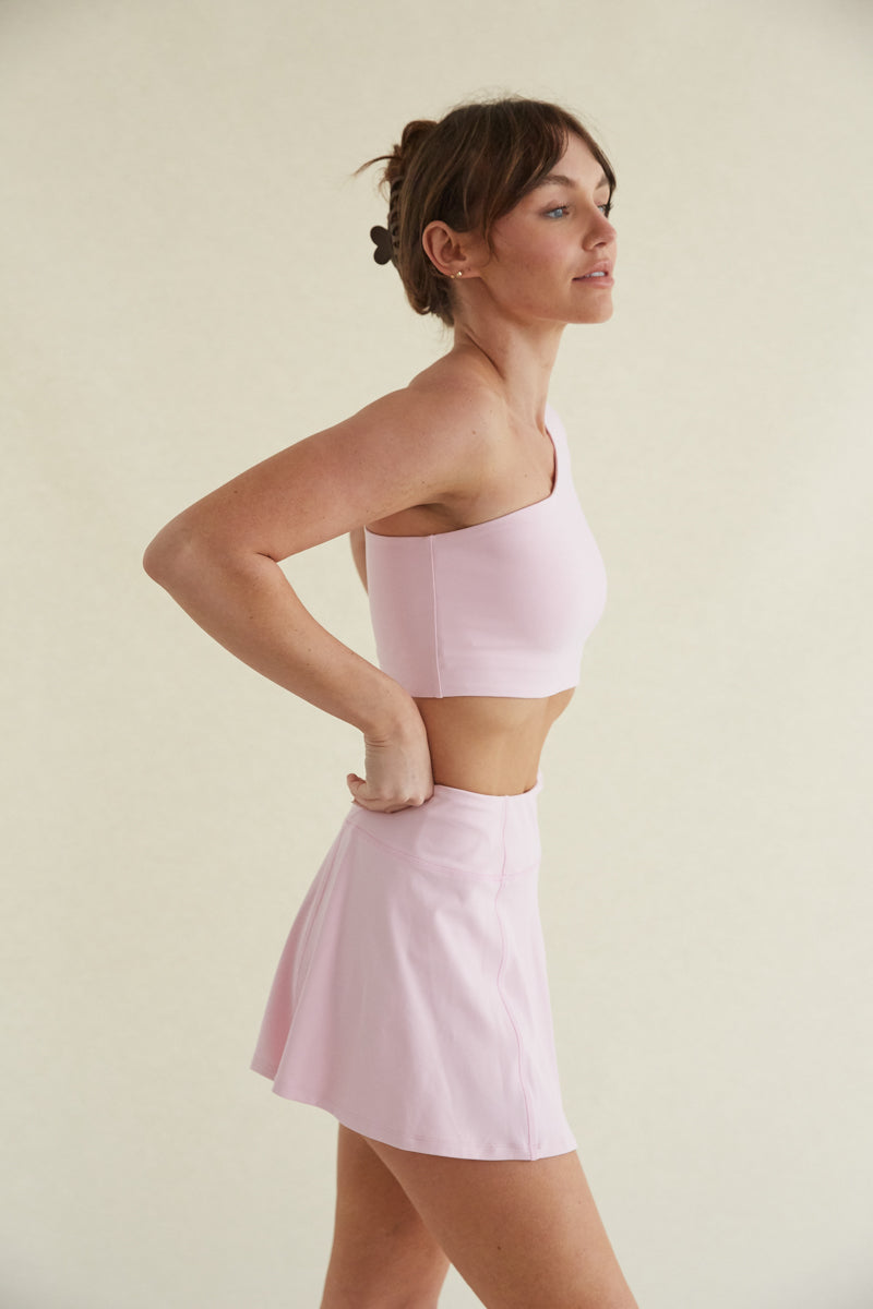 Pink flattering flare tennis skort with built in pockets and shorts- feminine activewear