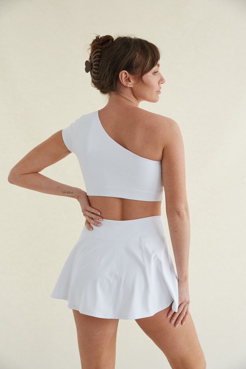 Avery Smoothing Flare Tennis Skort in White - American Threads –  americanthreads
