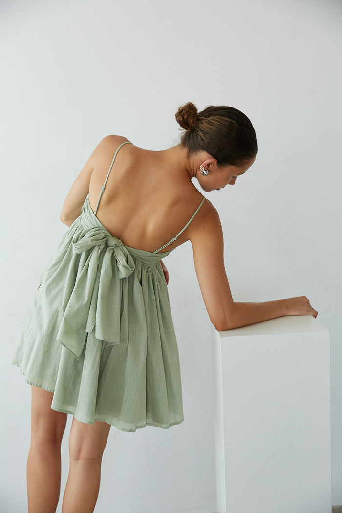 Green-Image | Back View | Pleated bust spag strap open tie back babydoll mini dress | Rush Dress