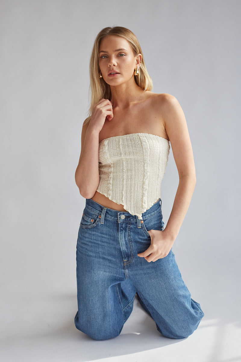 stretchy ivory tube top with trendy popcorn texture and asymmetrical bottom | unique basic tube tops for darty