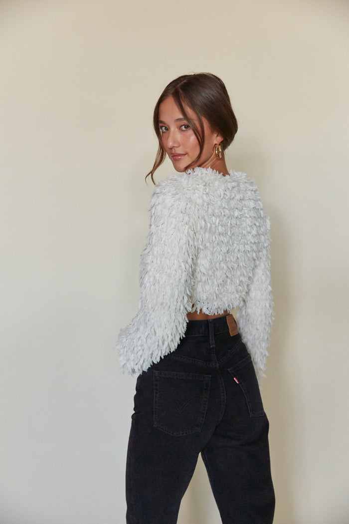 white fluffy fringe cropped sweater | unique winter styles | feather texture cropped jacket