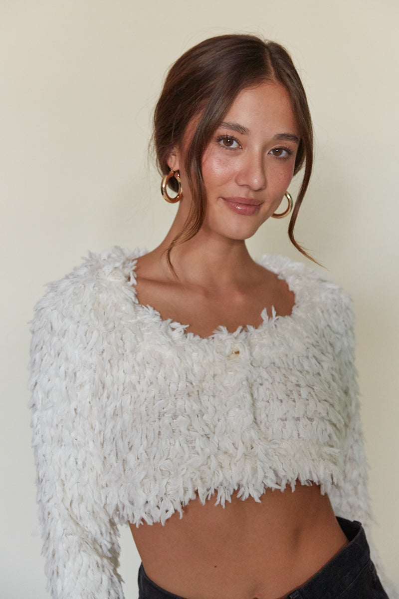 white cropped feathery cardigan for holiday parties | holiday shopping outfit inspo