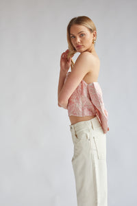 pink and gold mettalic strapless going out top with large bow on back | trendy statement going out tops