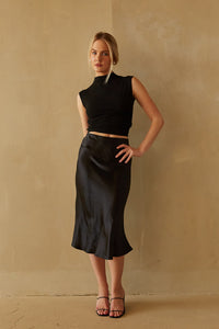 black dinner outfit boutique - the perfect black midi silk skirt