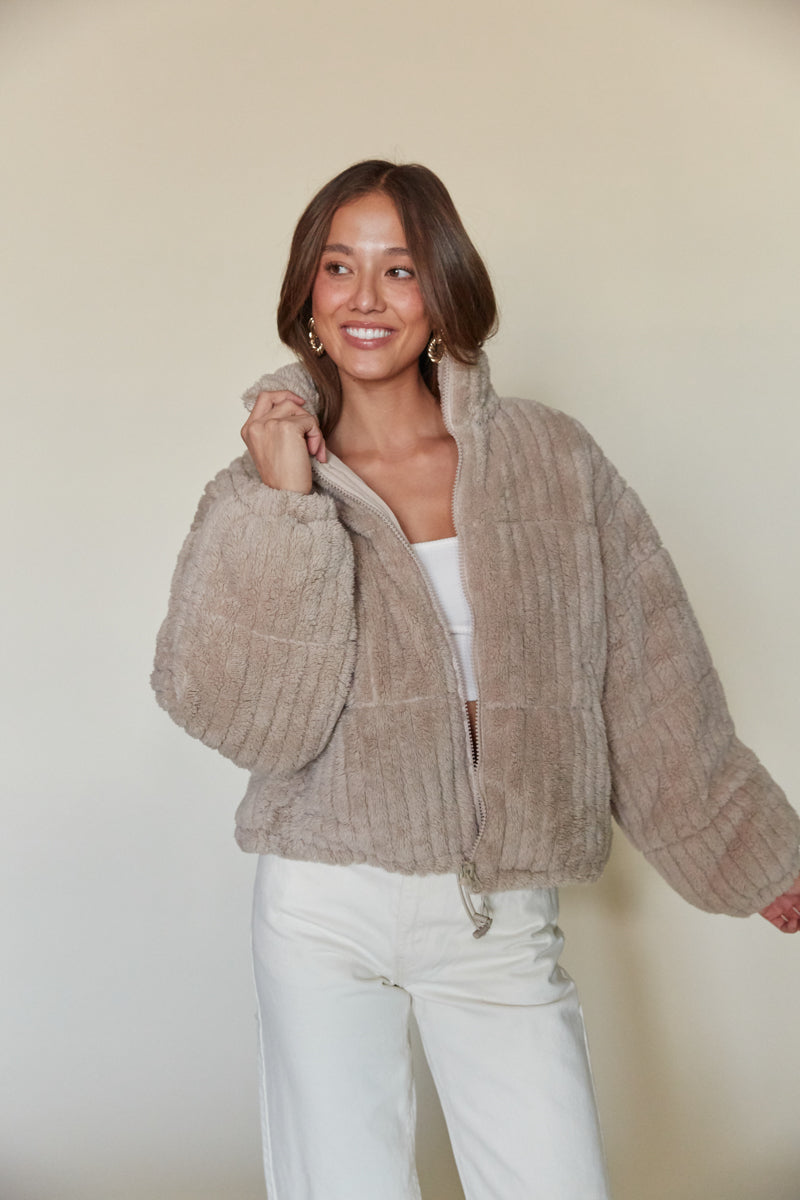beige fluffy puffer jacket for winter | trendy emma chamberlain jacket 