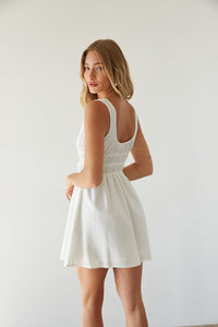 back view | white smocked waist mini dress | summer outfit inspo