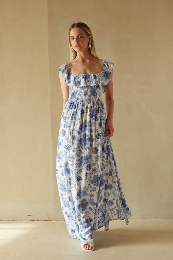 blue and white floral ruffle neckline smocked wait flowy maxi dress | unique maxi dress boutique