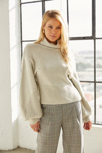 grey turtleneck knit sweater. 
