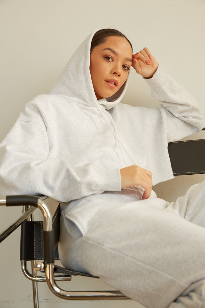 Cropped hoodie and sweatpants set.