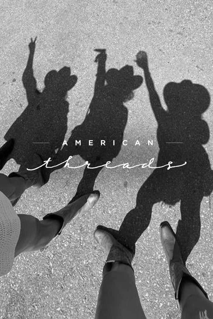 american threads gift card: background has shadows of 3 girls in cowboy hats and cowboy boots 