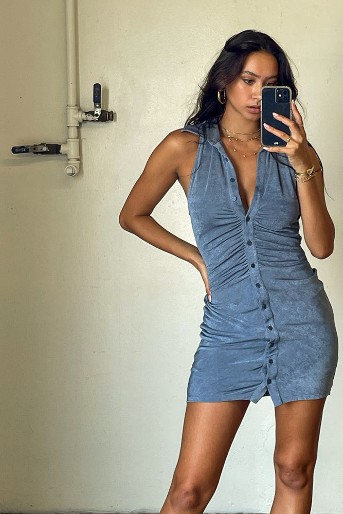 mirror selfie of blue collared dress