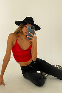 Mirror selfie in red bustier crop top