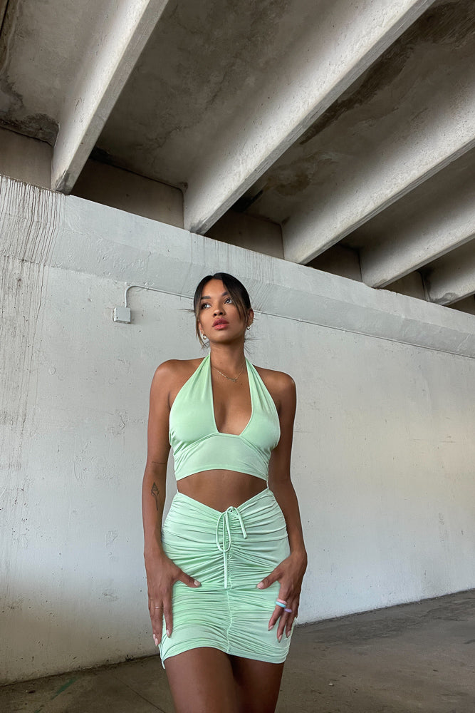 Front view of lime green skirt set
