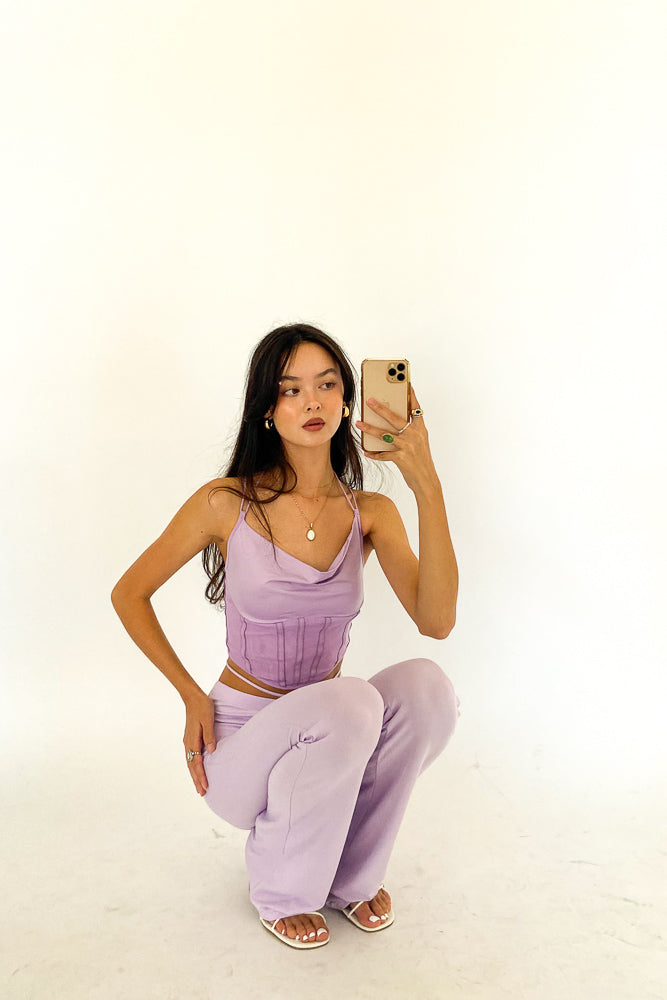 Mirror selfie in purple bustier crop top