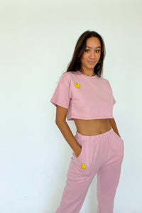 Front view of pink cropped tee