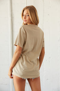 Back view of graphic tee.