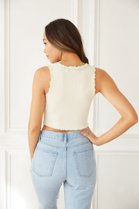 The back of this top is ribbed and cropped. 