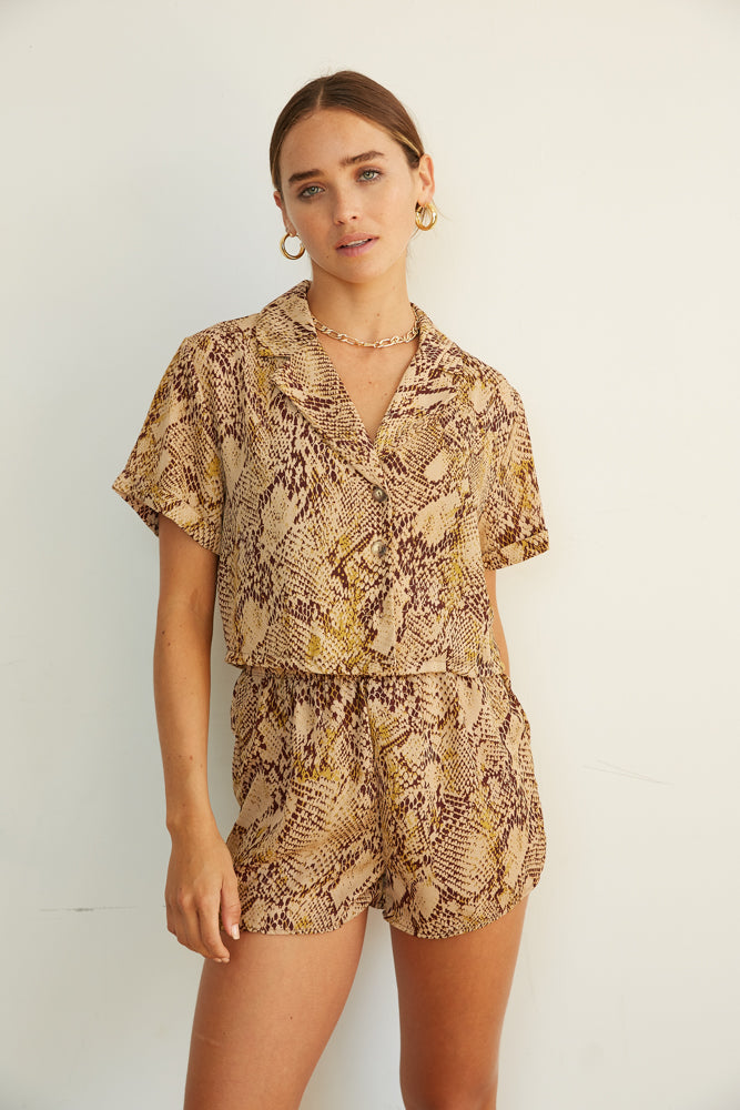 Snakeskin blouse with matching shorts. 