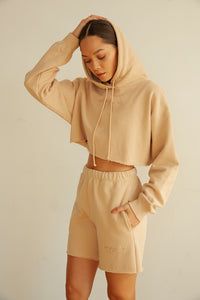 Embroidered detail of the cropped hoodie.