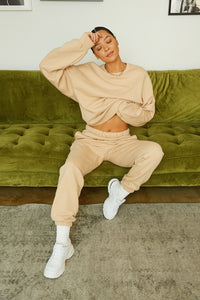 Tan oversized crew neck sweater.