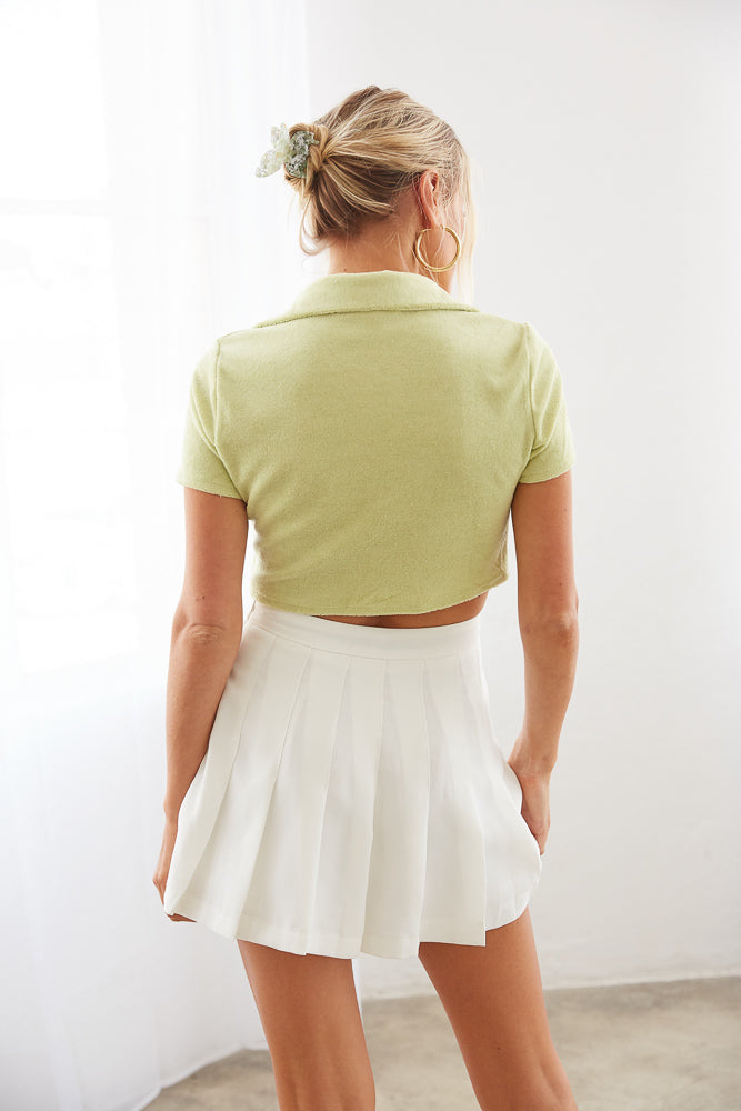 Back view of white tennis skirt. 