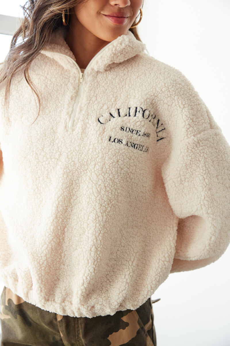 los angeles california embroidered sweatshirt - ivory sherpa quarter zip with la embroider detail - so cal sherpa sweatshirt
