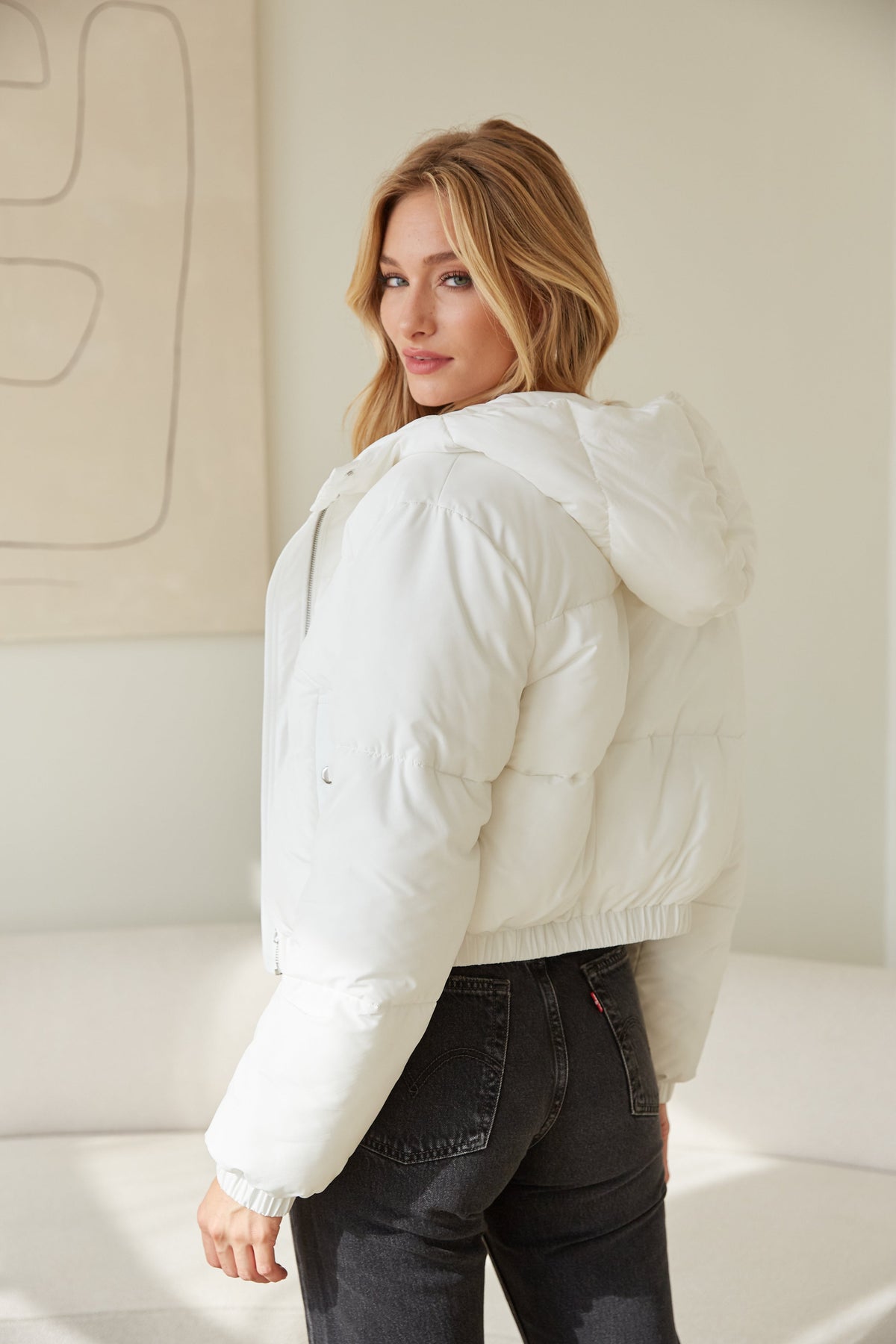 white hooded puffer jacket - cropped ivory puffer - trendy snow apparel - cozy puffer jackets - cute puffers for winter - sporty white puffer coat