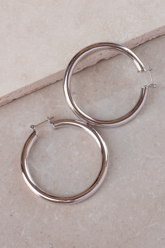 simple classic silver luv aj hoop earrings