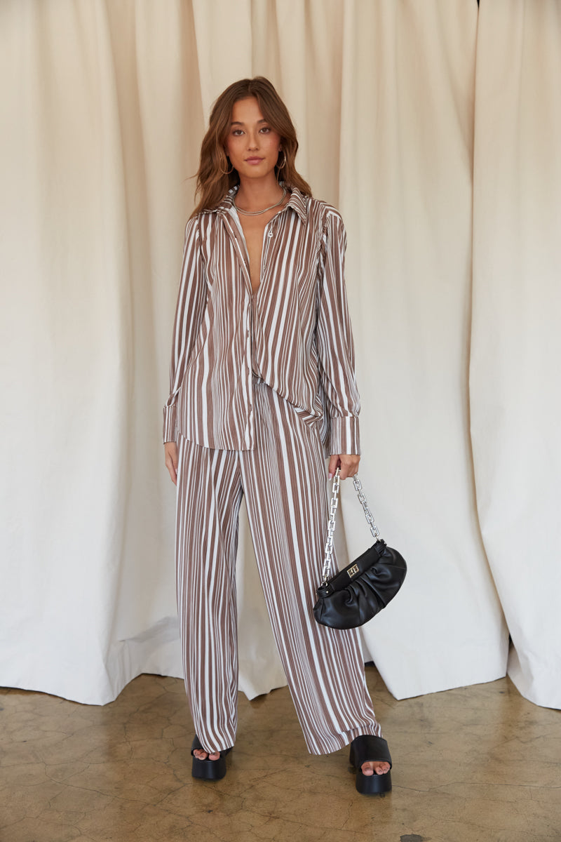 relaxed oversized collared button up - plisse loungewear fit for date night - relaxed work outfit inspo - back to school style