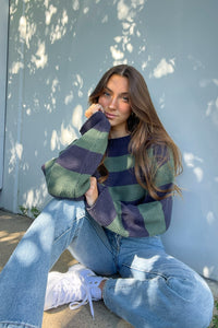 green and navy striped sweater