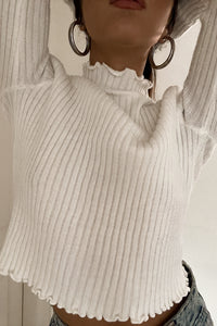 white mock neck top