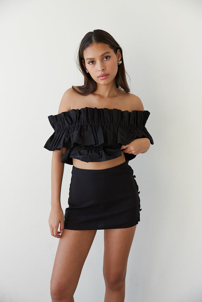 black button mini skirt