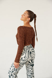 Cropped sweater in brown- paired well with fun pants for a trendy look