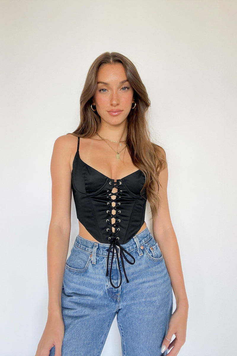 black corset top with levi jeans