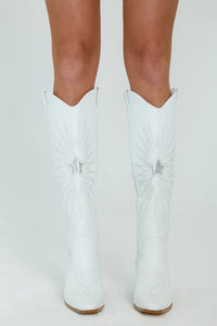 tall white western boots with silver stars