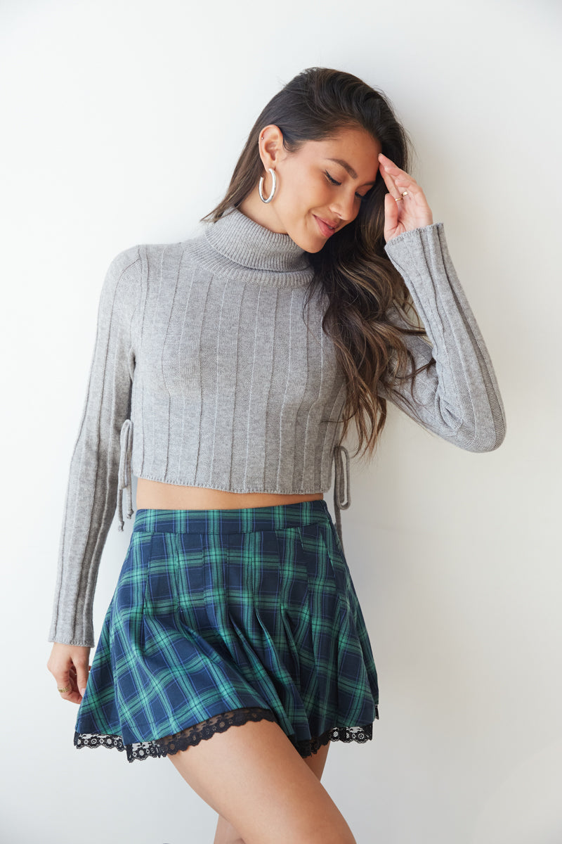 green and navy blue plaid skirt with lace trim