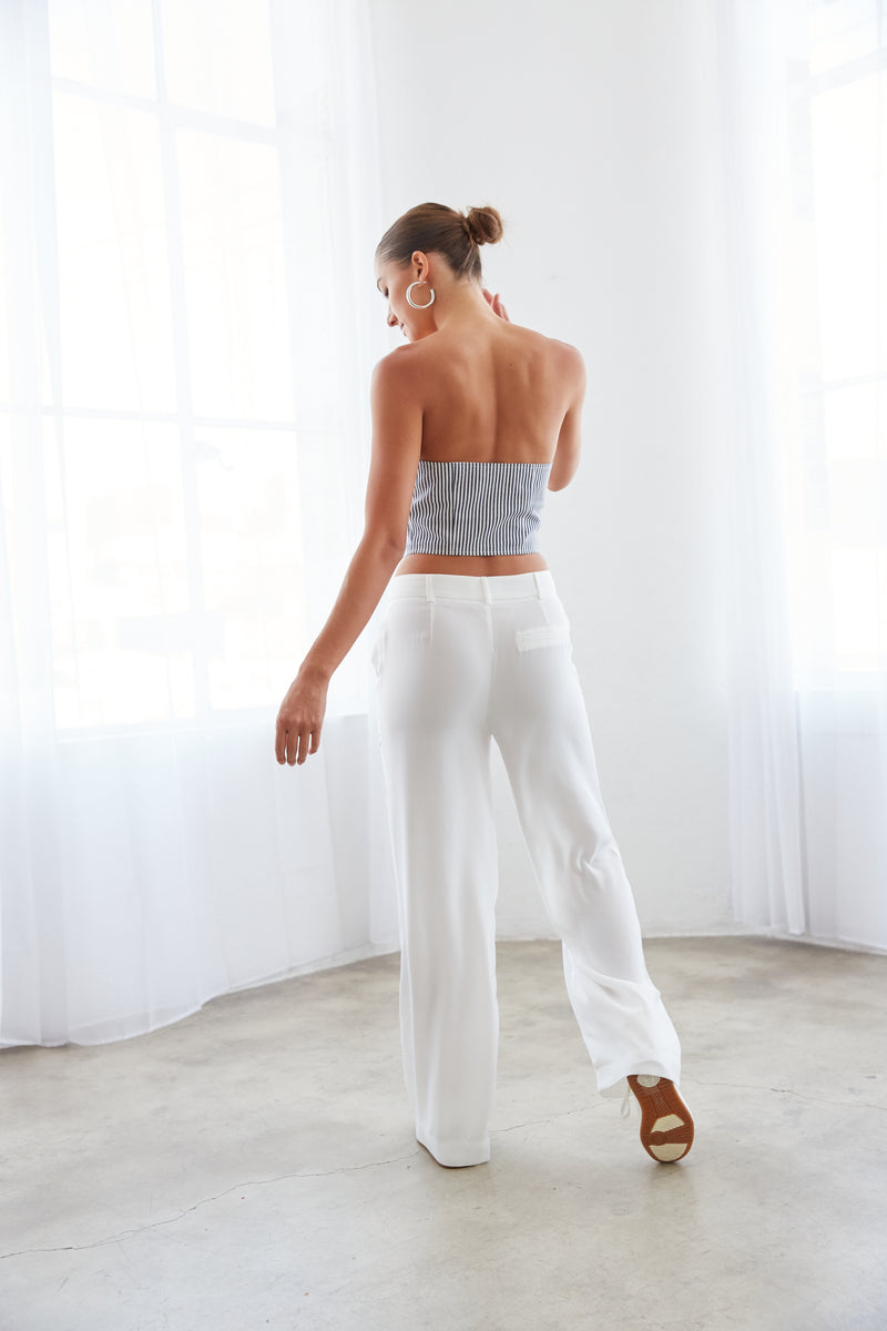 white loose fit trouser pants - how to style the lioness east gate corset top - trendy fashion