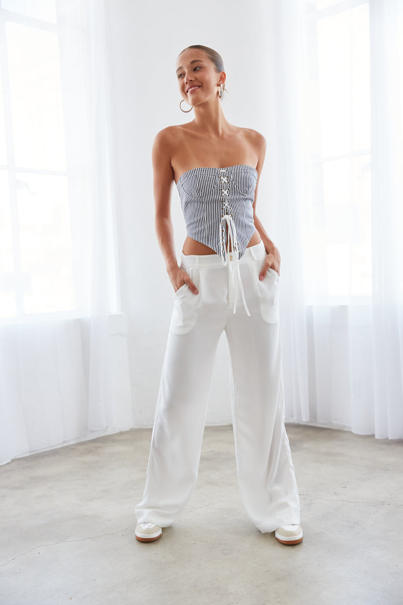 white wide leg trouser pants - how to style the lioness east gate corset top - streetwear fashion
