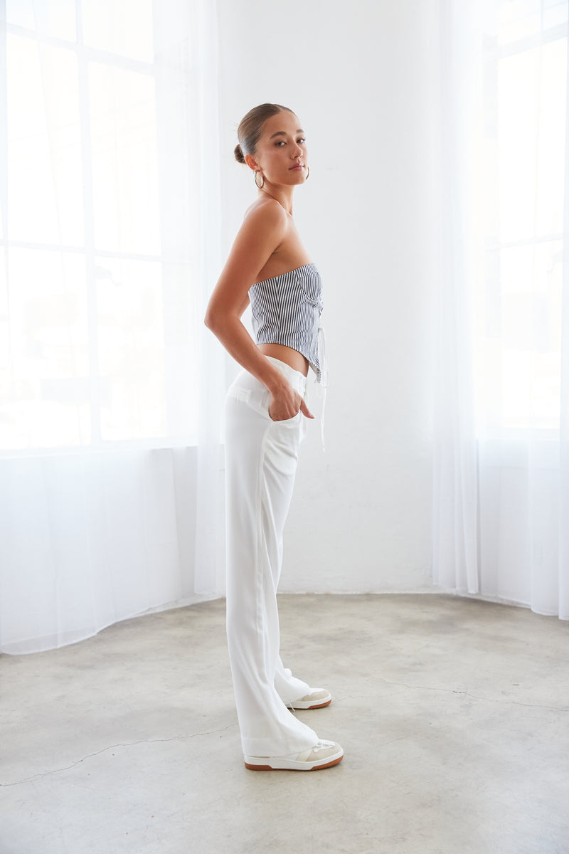 white pleated baggy trouser pants - how to style the lioness east gate corset top - streetwear fashion