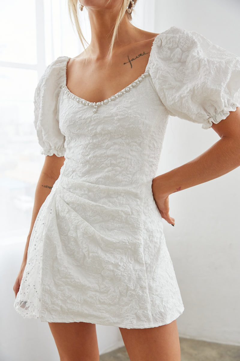 white puff sleeve lace dress - mini dress with embroidered pearls - mini dresses for brides - bridal shower outfit inspo