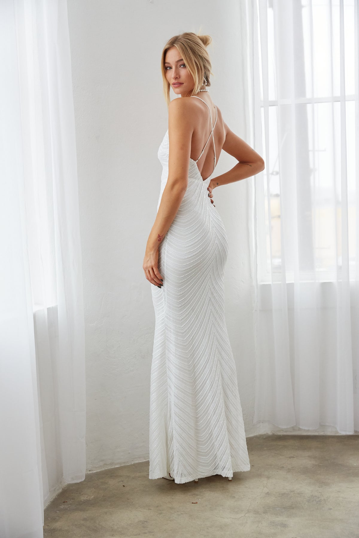 long white sequin dress - mermaid style maxi dress - wedding reception dress - thin strap v neck dress - bridal outfit inspo