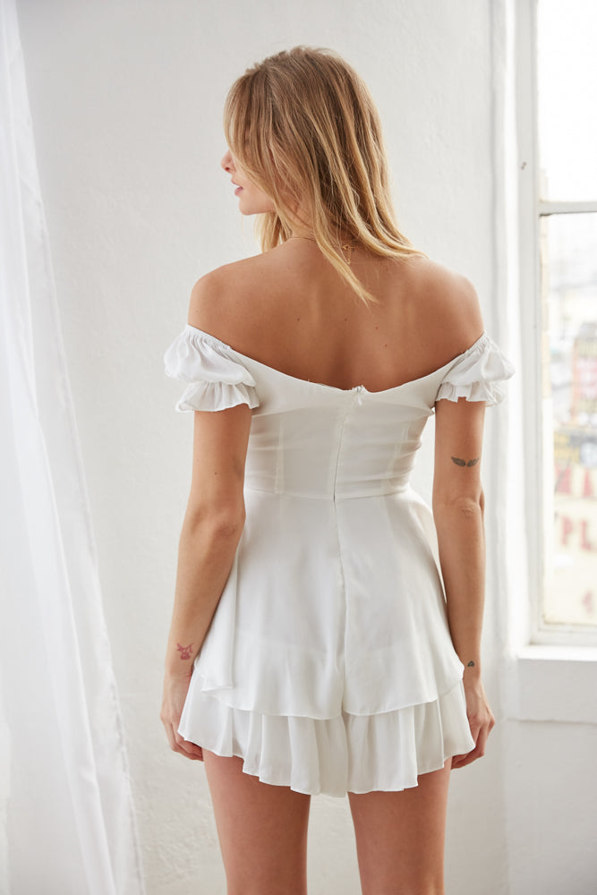 white off shoulder dress with puff sleeves