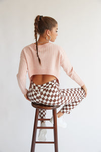 pink knit open back sweater