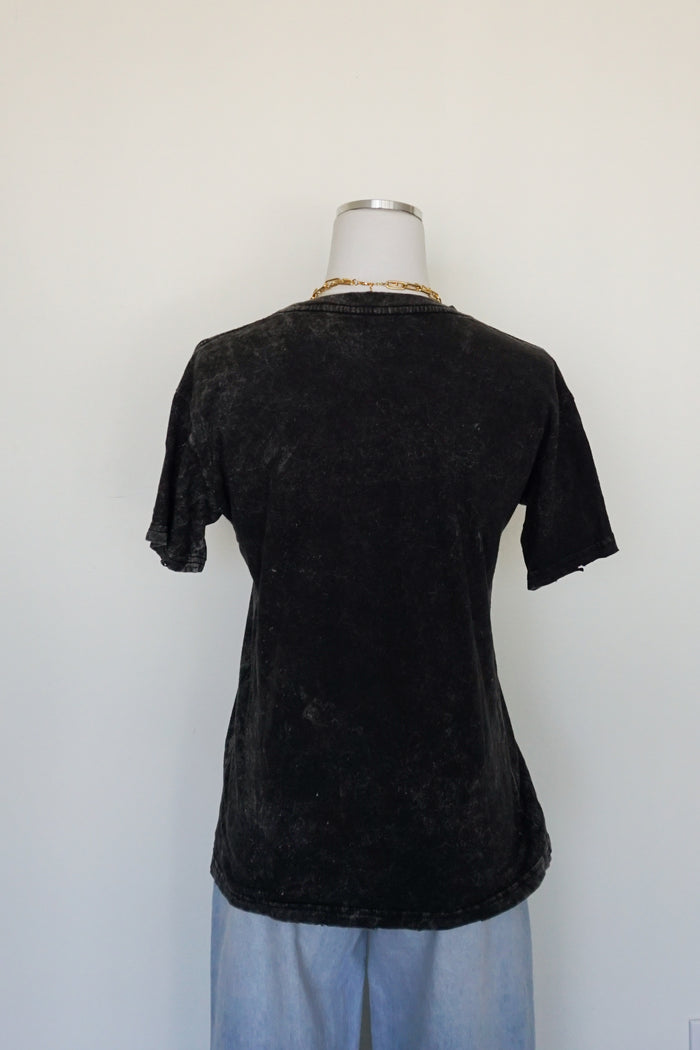 Back view of distressed band tee
