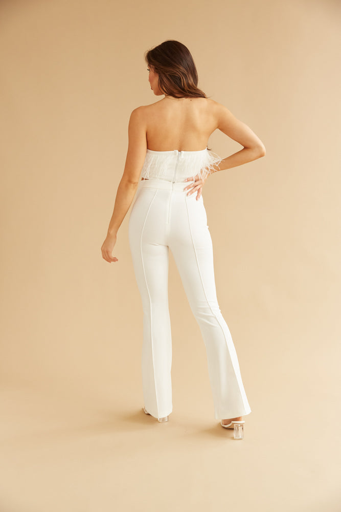 white crop top with matching white pants feather trim as seen on Delaney Childs