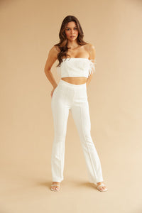white cropped tube top with matching white trousers Delaney Childs