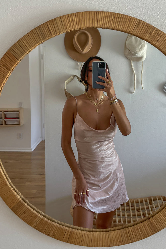mirror selfie in champagne satin mini dress