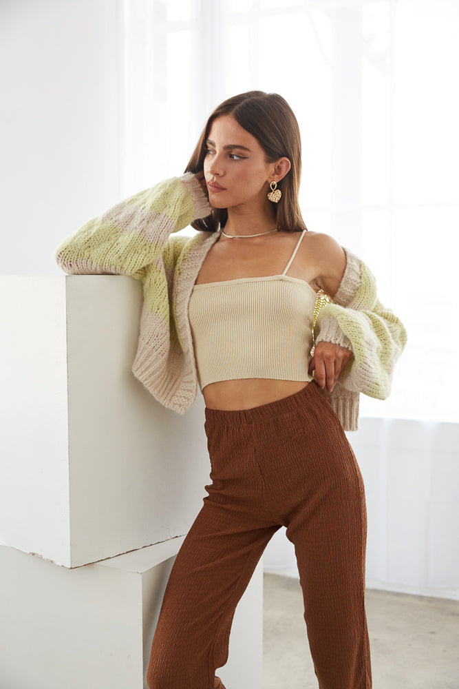 Green and cream knitted sweater